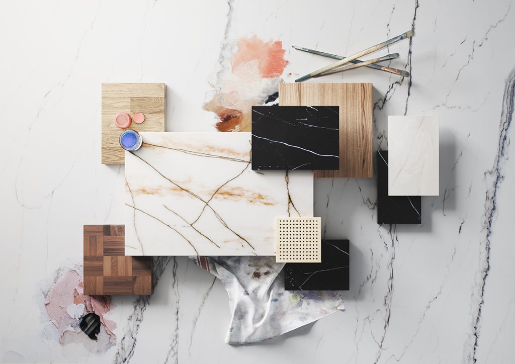 Moodboard en 3D que combina diferentes cerámicos con pintura y manteles verdes enrollados.